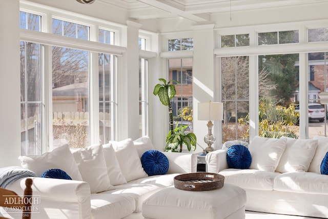 sunroom featuring beam ceiling and coffered ceiling