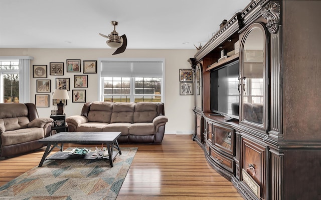 living area with light wood-style floors