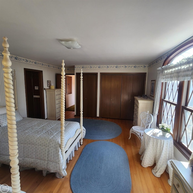 bedroom with wood finished floors