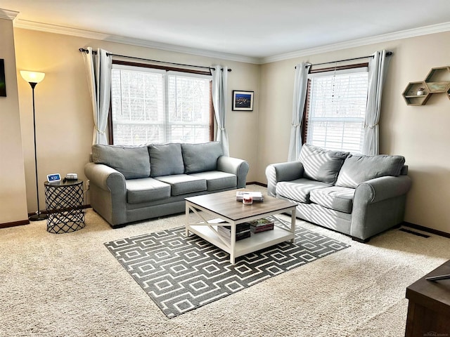 carpeted living room with baseboards and ornamental molding