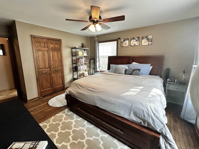 bedroom with a ceiling fan and wood finished floors