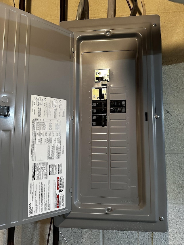 utility room featuring electric panel