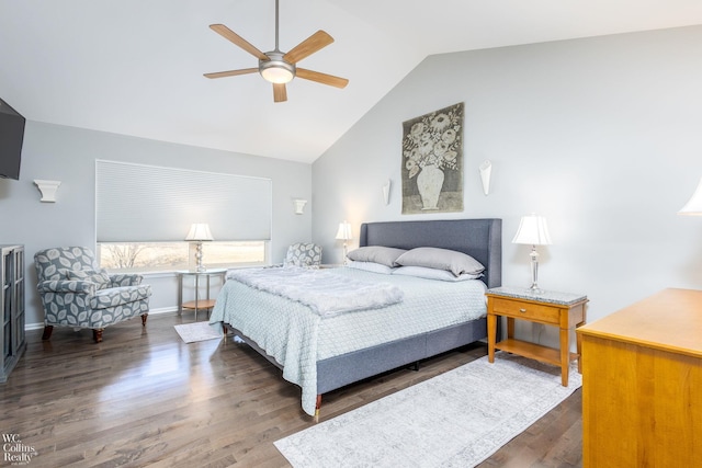 bedroom with baseboards, lofted ceiling, wood finished floors, and a ceiling fan