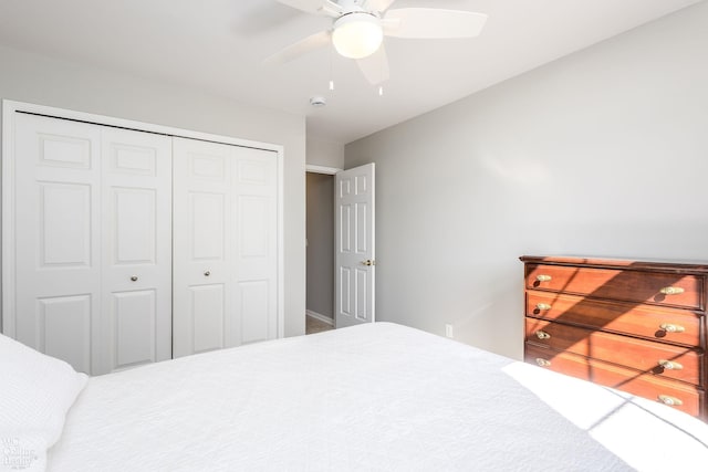 bedroom with a closet and ceiling fan