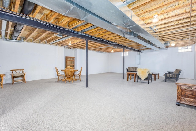 below grade area featuring electric panel and carpet floors