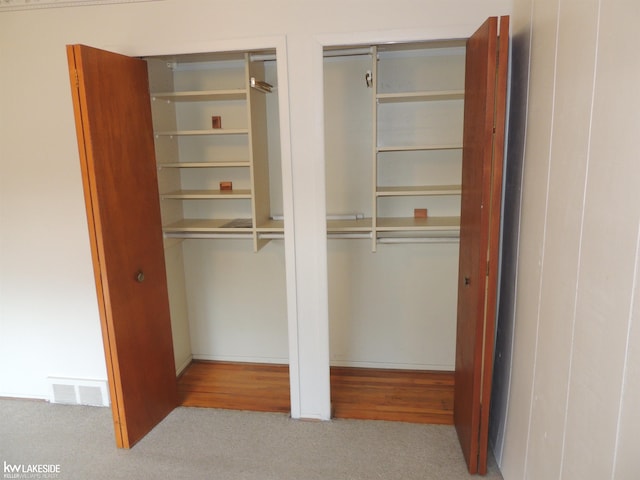 closet featuring visible vents