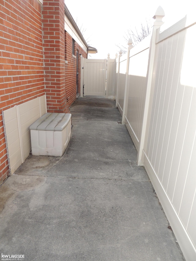 view of patio / terrace with a gate and fence