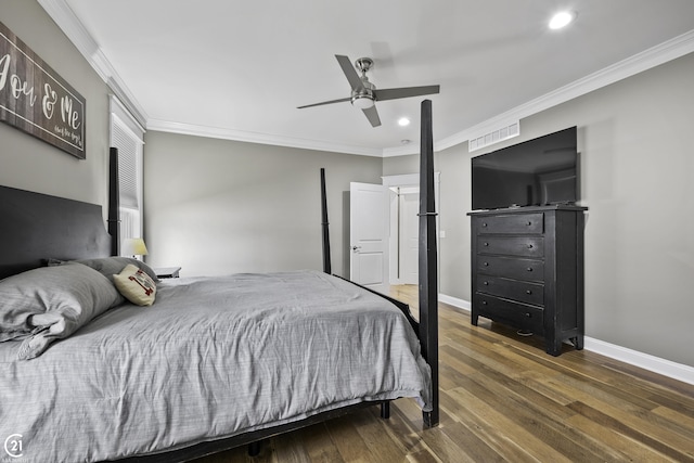 bedroom with recessed lighting, wood finished floors, baseboards, and ornamental molding