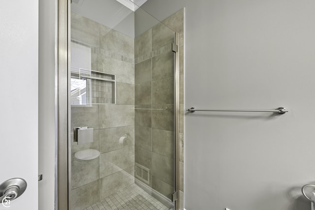 full bath featuring a shower stall and visible vents