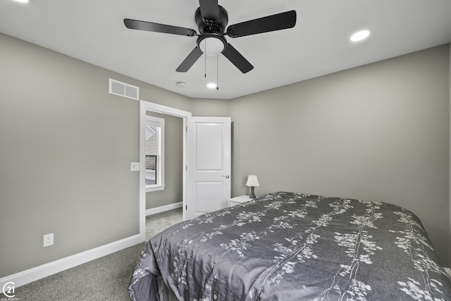 carpeted bedroom featuring recessed lighting, visible vents, baseboards, and a ceiling fan