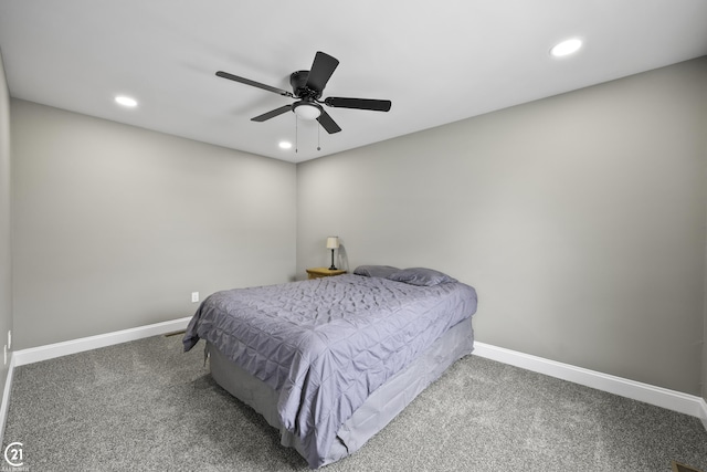 bedroom featuring recessed lighting, carpet, and baseboards