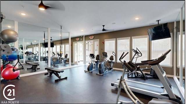 workout area featuring a wealth of natural light, recessed lighting, baseboards, and ceiling fan