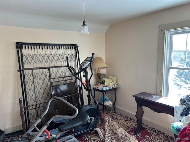 exercise room featuring baseboards