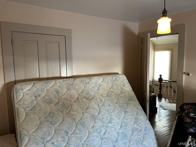 bedroom featuring wood finished floors