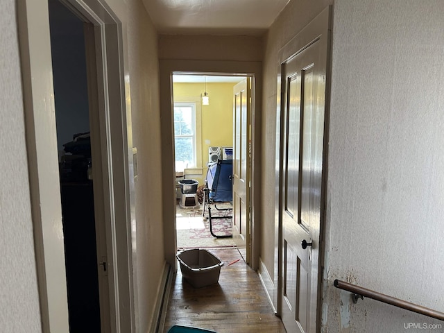 corridor with wood finished floors