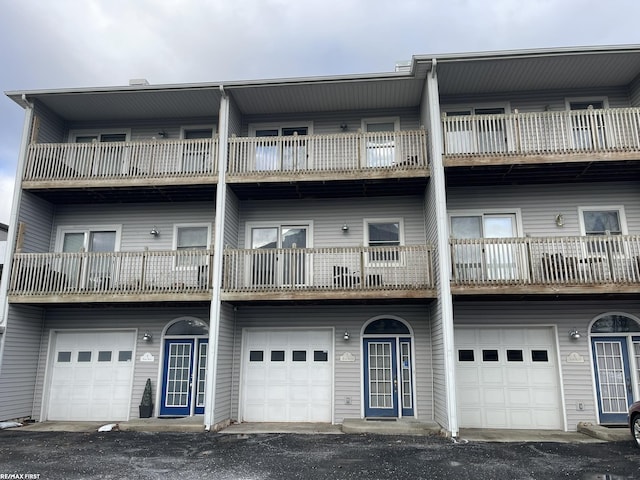 view of building exterior with an attached garage