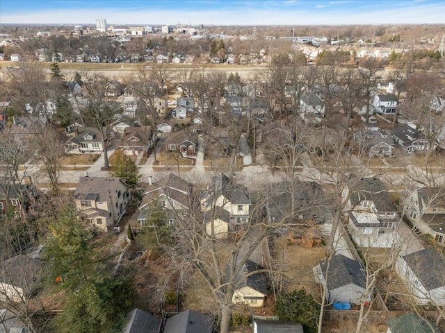 birds eye view of property with a residential view