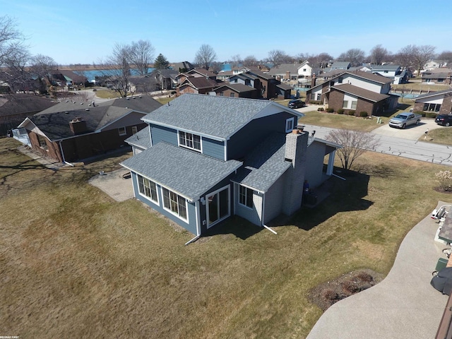 birds eye view of property featuring a residential view