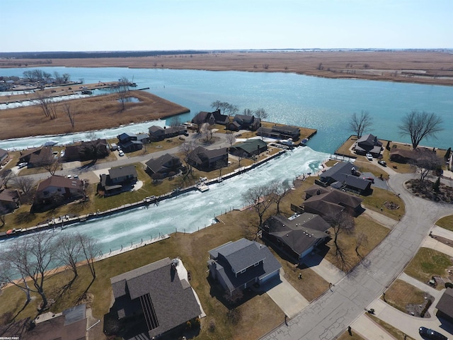 aerial view featuring a residential view and a water view