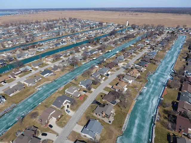 birds eye view of property with a residential view