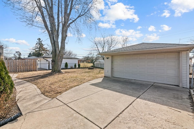 detached garage with fence