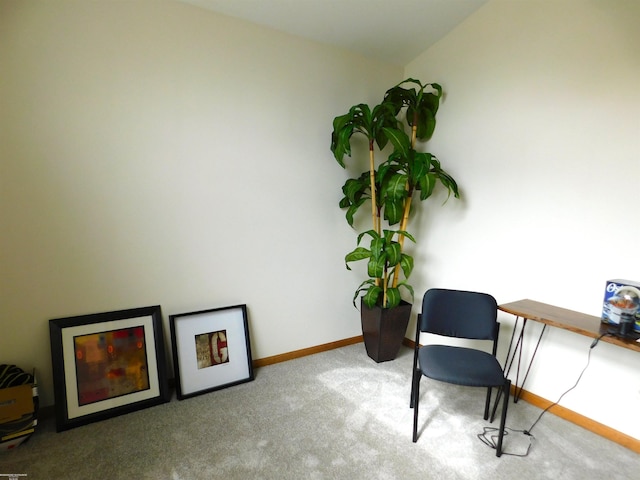 carpeted office featuring baseboards