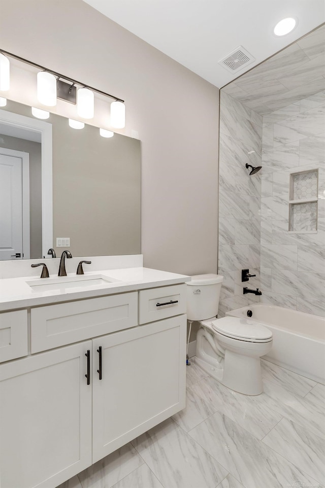 bathroom featuring visible vents, marble finish floor, toilet, and vanity