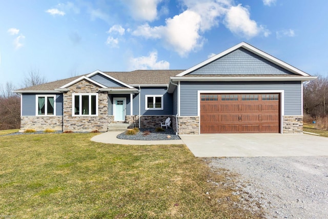 craftsman-style home featuring concrete driveway, an attached garage, and a front lawn