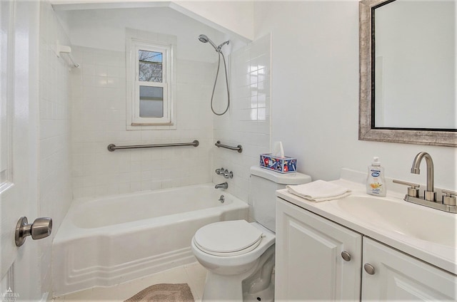 bathroom featuring tile patterned flooring, vanity, toilet, and tub / shower combination