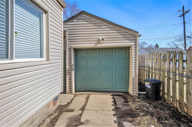 detached garage with fence