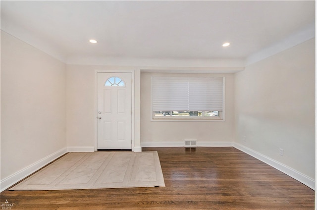 entrance foyer featuring visible vents, recessed lighting, baseboards, and wood finished floors