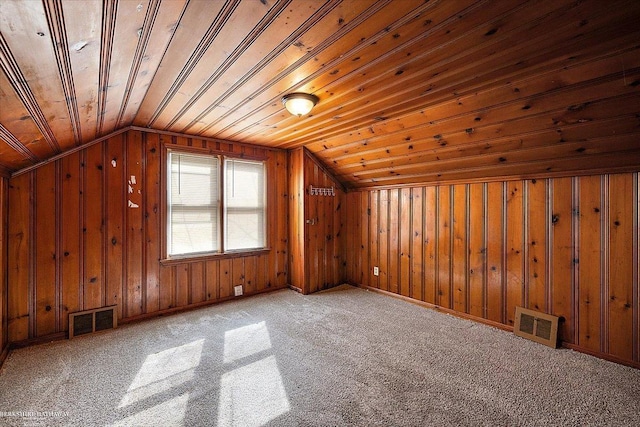 bonus room featuring lofted ceiling, visible vents, and wooden ceiling