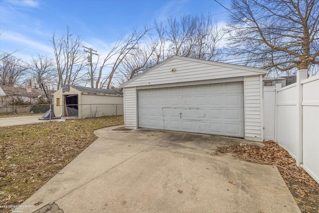 detached garage with fence