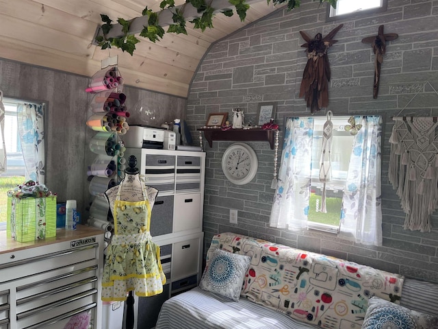 bedroom featuring lofted ceiling