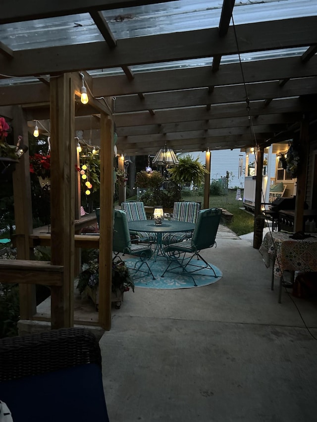 view of patio / terrace with outdoor dining area and a pergola