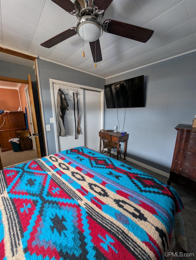 bedroom featuring a closet and a ceiling fan