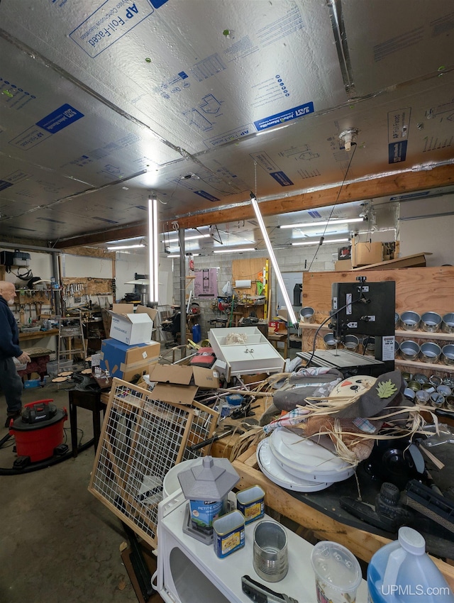 garage with a workshop area