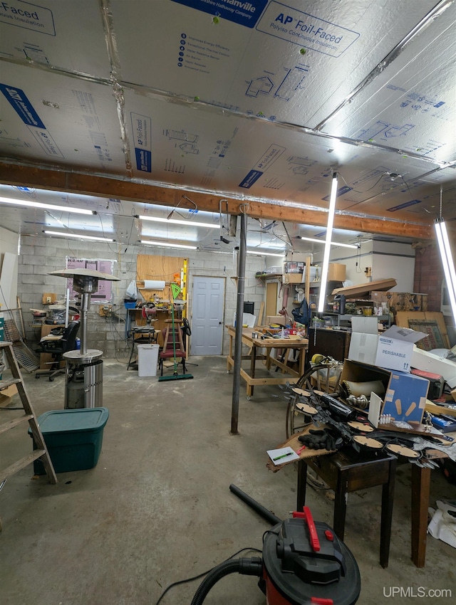 garage featuring a workshop area