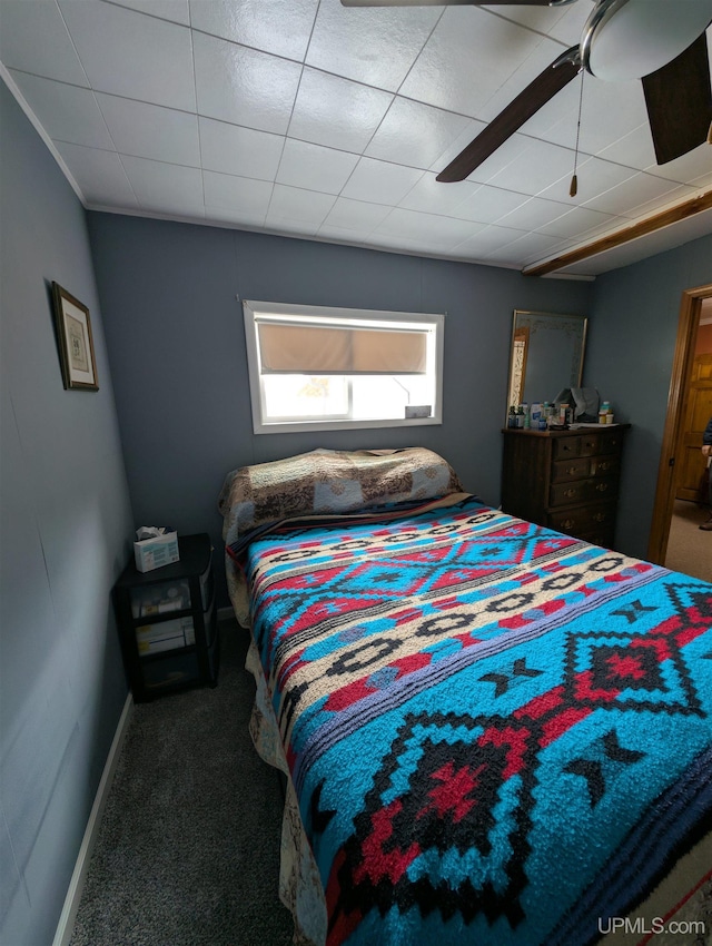 carpeted bedroom with baseboards