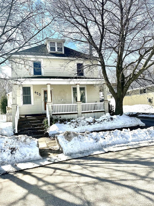 traditional style home featuring a porch