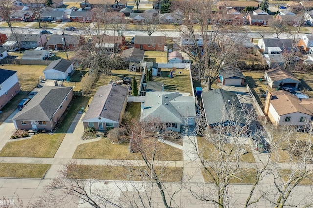 birds eye view of property with a residential view