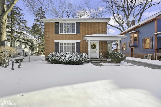 view of front of property featuring brick siding