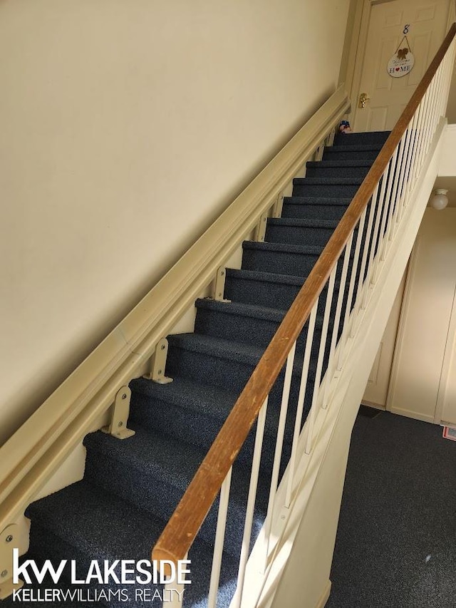 stairway with carpet flooring