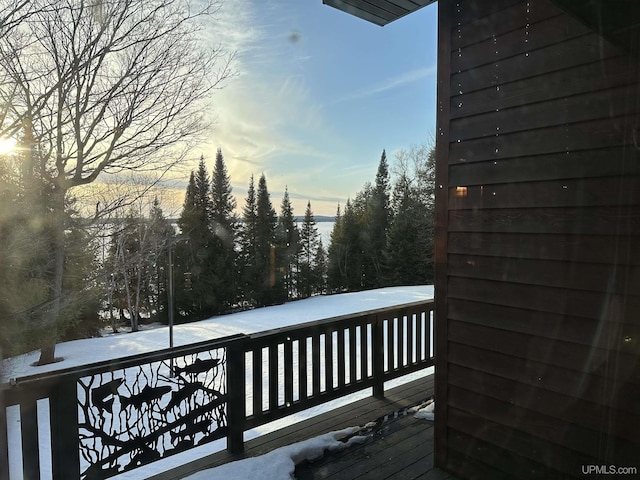 view of snow covered deck