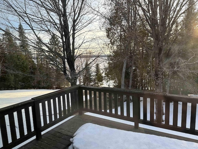 view of snow covered deck