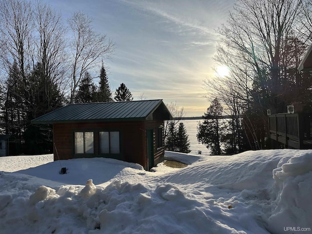 view of snow covered garage