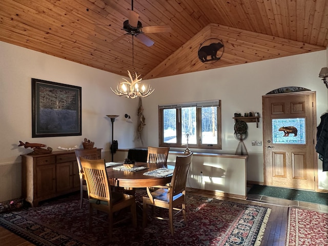 dining room featuring high vaulted ceiling, ceiling fan with notable chandelier, wood ceiling, and hardwood / wood-style floors