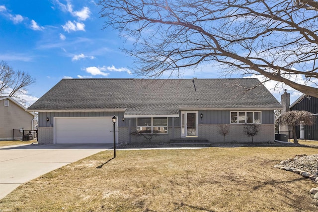 ranch-style house featuring driveway, an attached garage, brick siding, a front lawn, and board and batten siding