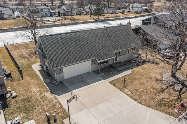 drone / aerial view featuring a residential view