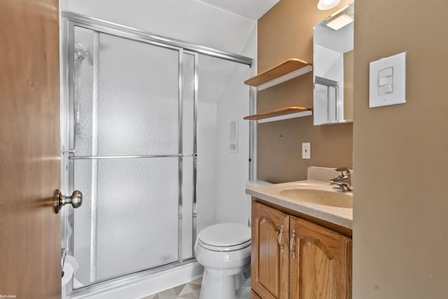 full bath with toilet, a stall shower, and vanity